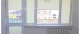 Rolety białe okna balkonowe
